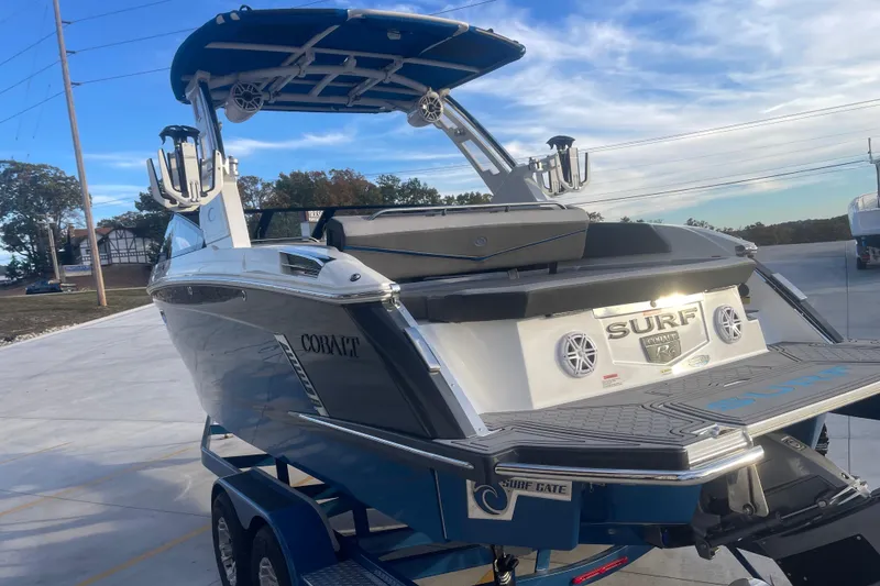 Slide: The Image of 2023 Cobalt R6 Surf boat on trailer, featuring sleek design and advanced wakeboarding features. - 8