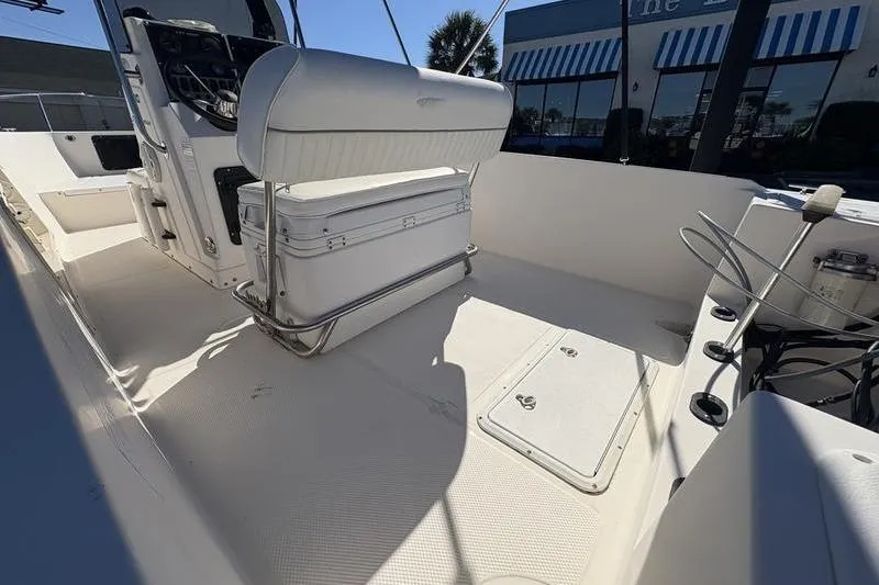 Slide: The Image of 2002 Key West 1900 Center Console boat interior with seating and storage. - 10