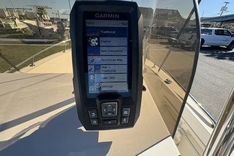 Slide: The Image of Garmin device on 2002 Key West 1900 Center Console boat dashboard. - 13