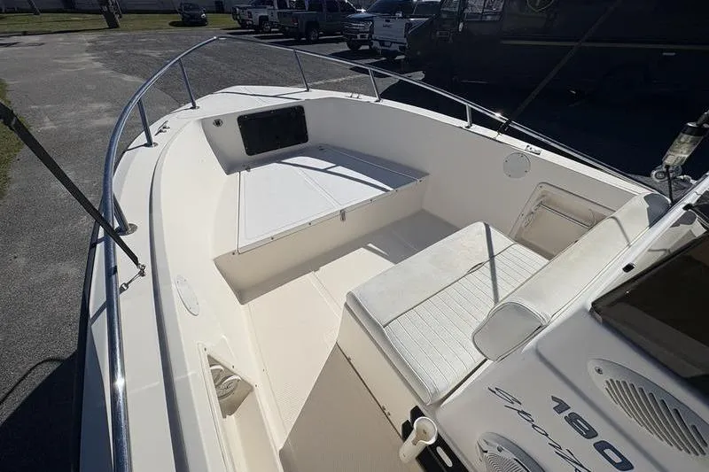 Slide: The Image of 2002 Key West 1900 Center Console boat interior with seating and storage. - 21