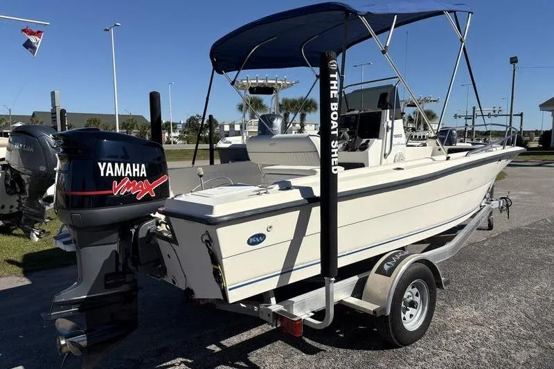 Slide: The Image of 2002 Key West 1900 Center Console boat with Yamaha VMAX engine on trailer. - 4