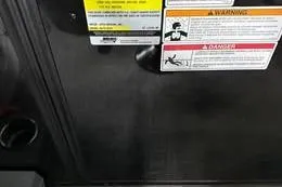 Slide: The Image of Warning labels on 2025 Qwest Lanai E-Class Tripletoon boat panel. - 11