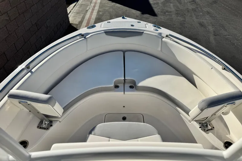 Slide: The Image of 2022 Robalo R222 Center Console boat with spacious seating area. - 12