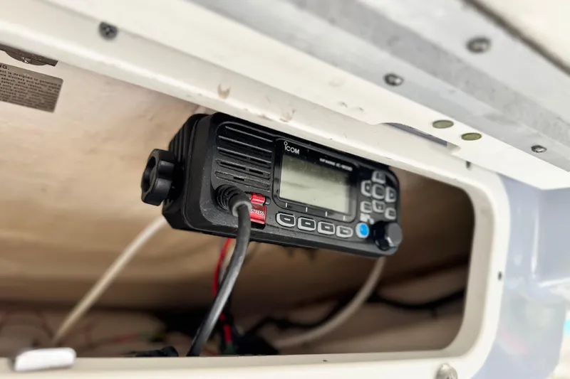 Slide: The Image of VHF radio installed in 2022 Robalo R222 Center Console boat compartment. - 29