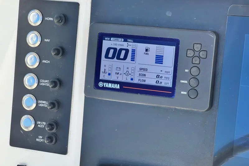 Slide: The Image of Control panel of 2022 Robalo R222 Center Console with Yamaha display and switches. - 32