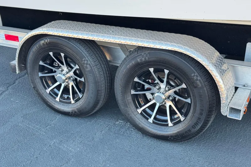 Slide: The Image of Trailer wheels of a 2022 Robalo R222 Center Console boat. - 34