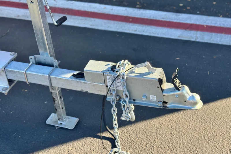 Slide: The Image of Trailer hitch with chains for 2022 Robalo R222 Center Console boat. - 35