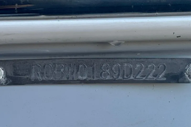 Slide: The Image of 2022 Robalo R222 Center Console boat identification number plate. - 37