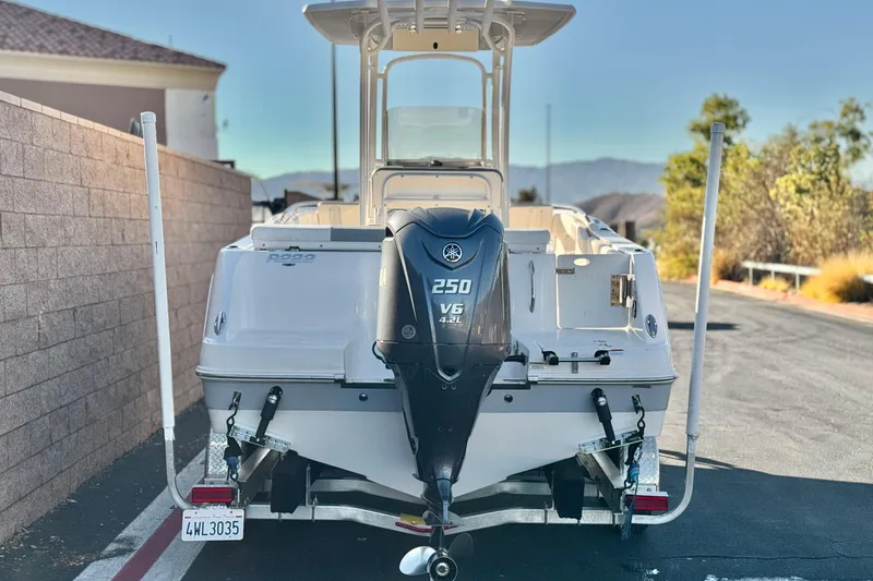 Slide: The Image of 2022 Robalo R222 Center Console boat with Yamaha 250 V6 engine on trailer. - 4