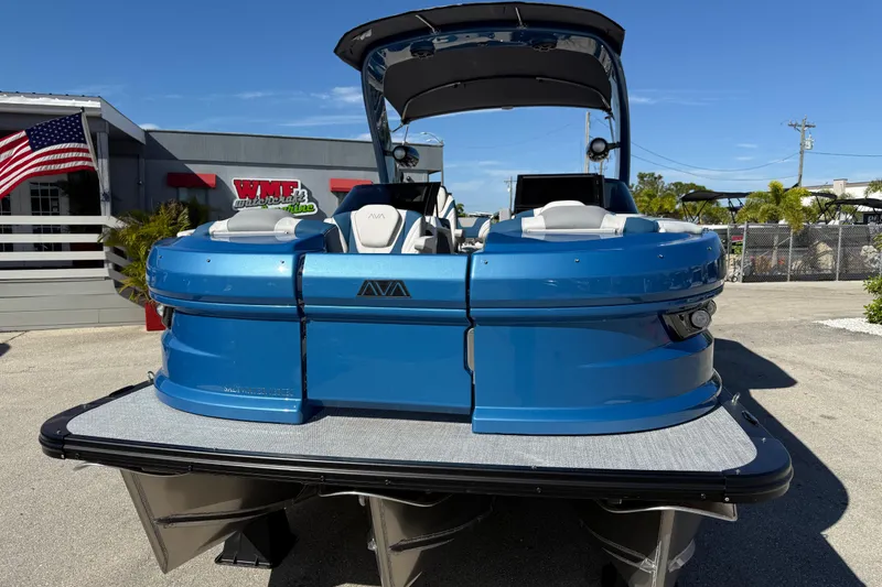 Slide: The Image of 2026 Avalon 2585 Excalibur Tri-toon boat with Mercury 400hp V-10 engine, blue exterior. - 4