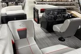 Slide: The Image of 2026 Qwest C-Class 14 Cruise boat interior with modern seating and steering console. - 5