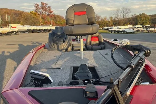 Slide: The Image of 2025 Tracker Pro Team 175 boat with fishing seat and equipment on deck. - 9