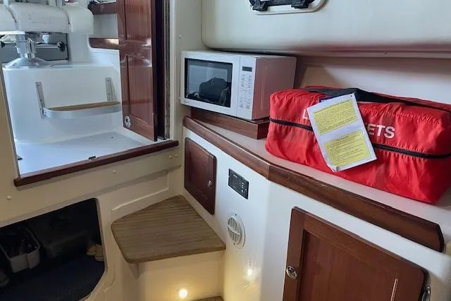 Slide: The Image of Control panel of a 2023 NorthCoast 315 boat featuring Westerbeke engine controls. - 15