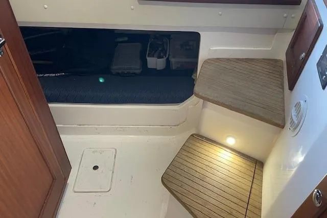 Slide: The Image of Control panel of a 2023 NorthCoast 315 boat featuring bow thruster and fire extinguisher controls. - 16