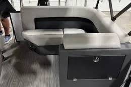 Slide: The Image of 2026 Qwest C-Class 18 Cruise interior with modern seating and storage. - 3