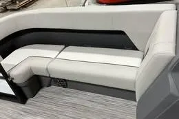 Slide: The Image of 2026 Qwest C-Class 18 Cruise boat interior with sleek, modern seating design. - 5