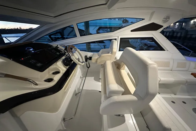 Slide: The Image of Interior of 2019 Beneteau Gran Turismo 40 yacht with modern helm and seating. - 20