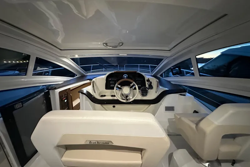 Slide: The Image of 2019 Beneteau Gran Turismo 40 cockpit with modern steering and controls, featuring sleek design. - 21
