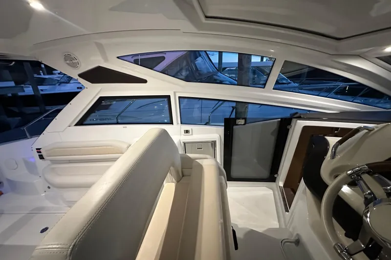 Slide: The Image of Interior view of 2019 Beneteau Gran Turismo 40 yacht, featuring sleek design and modern seating. - 23