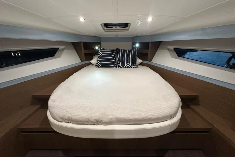Slide: The Image of Luxurious cabin interior of 2019 Beneteau Gran Turismo 40 yacht with cozy bed and modern design. - 29