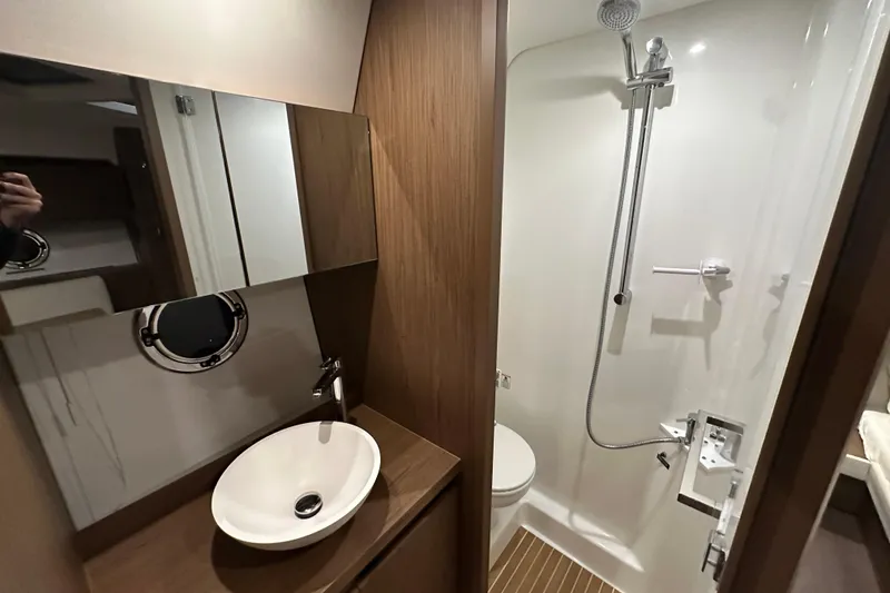 Slide: The Image of 2019 Beneteau Gran Turismo 40 yacht bathroom with modern sink and shower. - 33