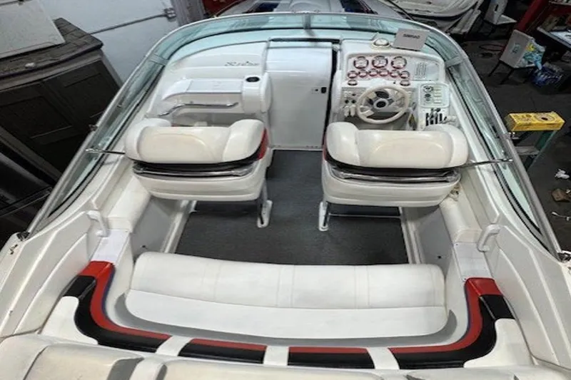 Slide: The Image of Interior cabin of a 2004 Formula 292 FASTech boat, featuring sleek, modern design. - 13