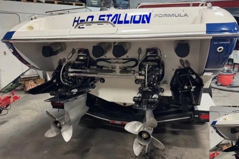 Slide: The Image of 2004 Formula 292 FASTech cabin interior with kitchenette and seating area. - 14