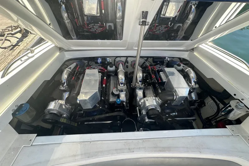 Slide: The Image of 2004 Formula 292 FASTech engine compartment with dual engines and polished components. - 20