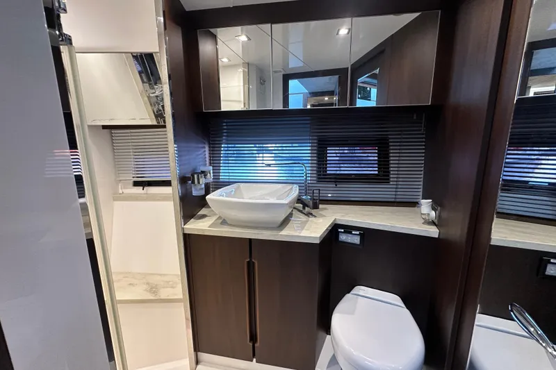 Slide: The Image of Luxurious bathroom interior of 2017 Galeon 560 Sky yacht with modern fixtures. - 19