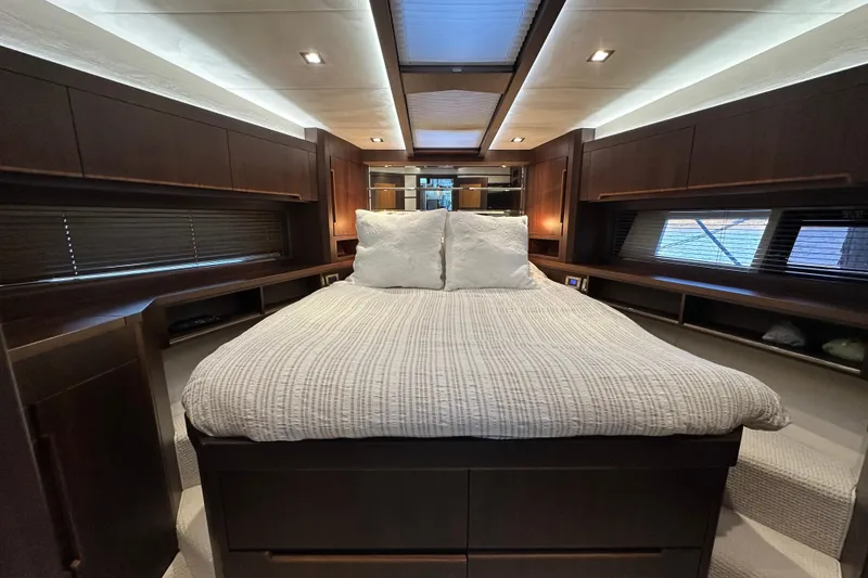 Slide: The Image of Luxurious bedroom interior of 2017 Galeon 560 Sky yacht with elegant wood finishes. - 20