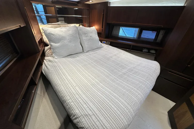 Slide: The Image of Luxurious bedroom interior of 2017 Galeon 560 Sky yacht with elegant bedding. - 22