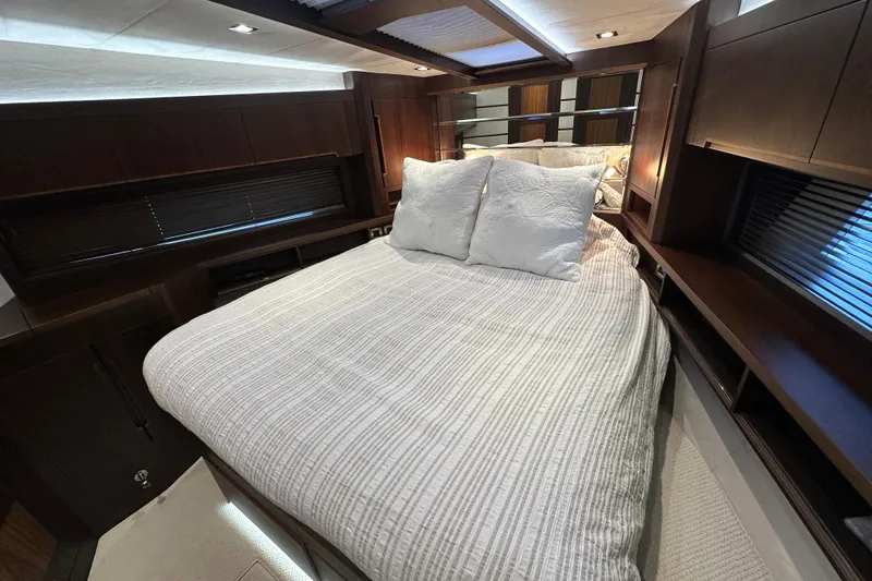 Slide: The Image of Luxurious bedroom interior of 2017 Galeon 560 Sky yacht with elegant bedding. - 23