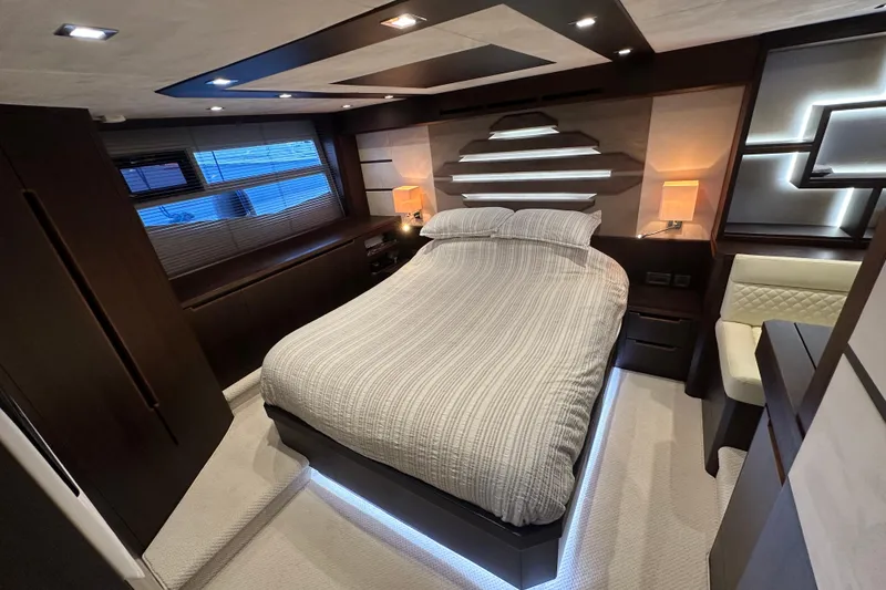 Slide: The Image of Luxurious bedroom interior of 2017 Galeon 560 Sky yacht with modern design and ambient lighting. - 25