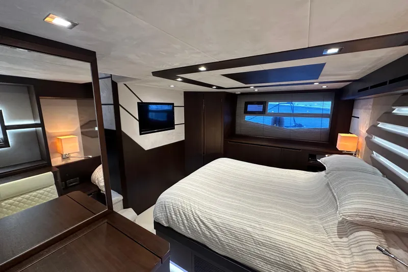 Slide: The Image of Luxurious interior of 2017 Galeon 560 Sky yacht with modern bedroom design. - 31