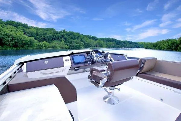 Slide: The Image of Luxurious 2017 Galeon 560 Sky yacht helm with scenic river view. - 33
