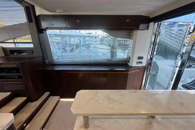 Slide: The Image of Interior of 2017 Galeon 560 Sky yacht with modern design and large windows. - 7