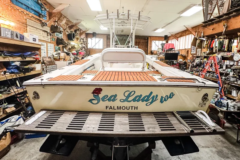 Slide: The Image of 2009 Blue Fin 240 Islander boat in workshop, named "Sea Lady too," Falmouth. - 12