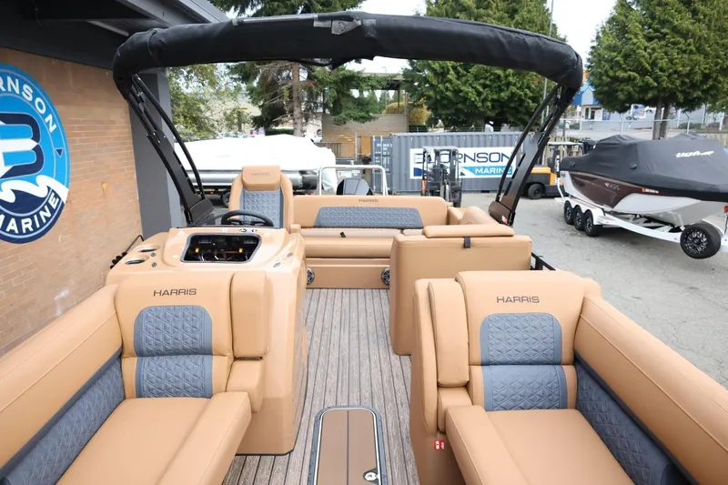 Slide: The Image of 2026 Harris Solstice 250 SL pontoon boat with luxurious seating and modern design. - 39
