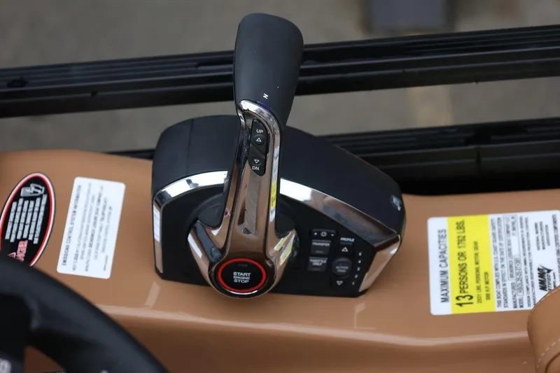 Slide: The Image of Throttle control of 2026 Harris Solstice 250 SL pontoon boat, featuring start/stop button. - 48