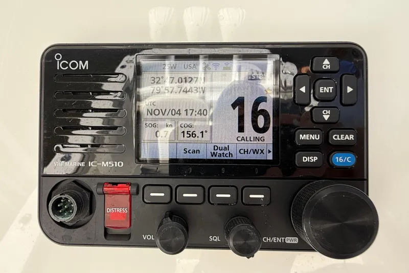 Slide: The Image of VHF marine radio IC-M510 on a 2022 Regulator 34 boat, displaying channel 16. - 11