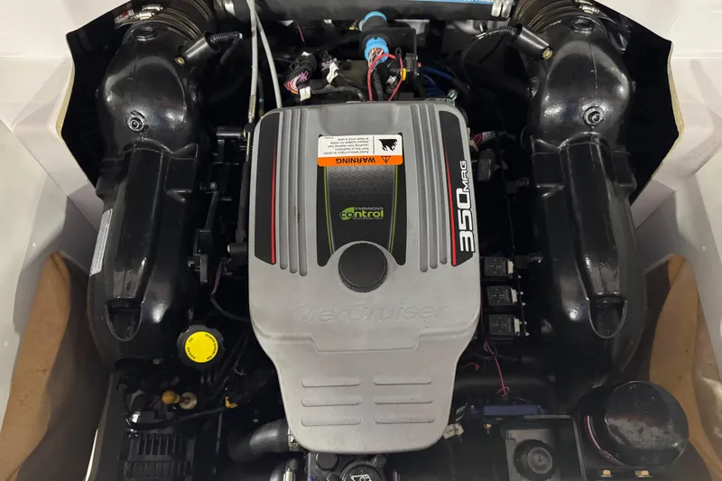 Slide: The Image of Engine of 2011 Four Winns 210 Horizon SS boat, featuring MerCruiser 350 MAG. - 12