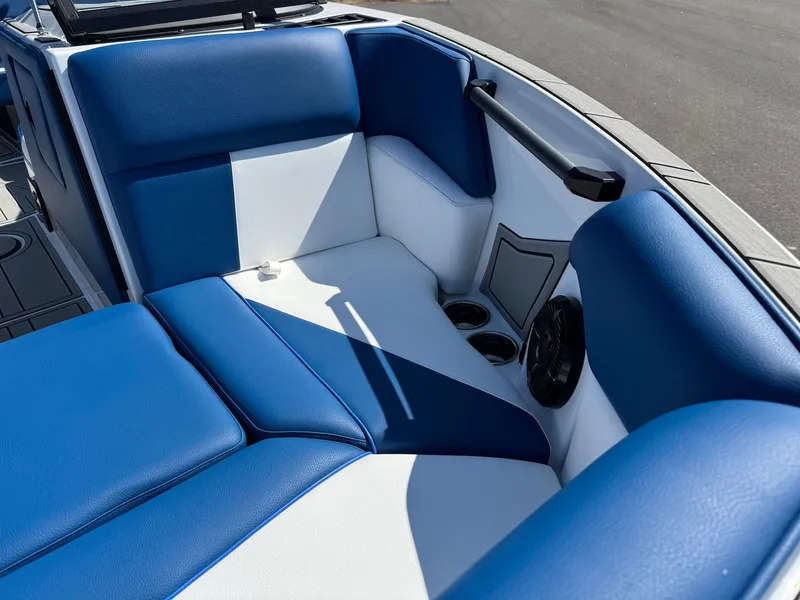 Slide: The Image of 2026 Moomba Mondo interior with blue and white seating. - 27