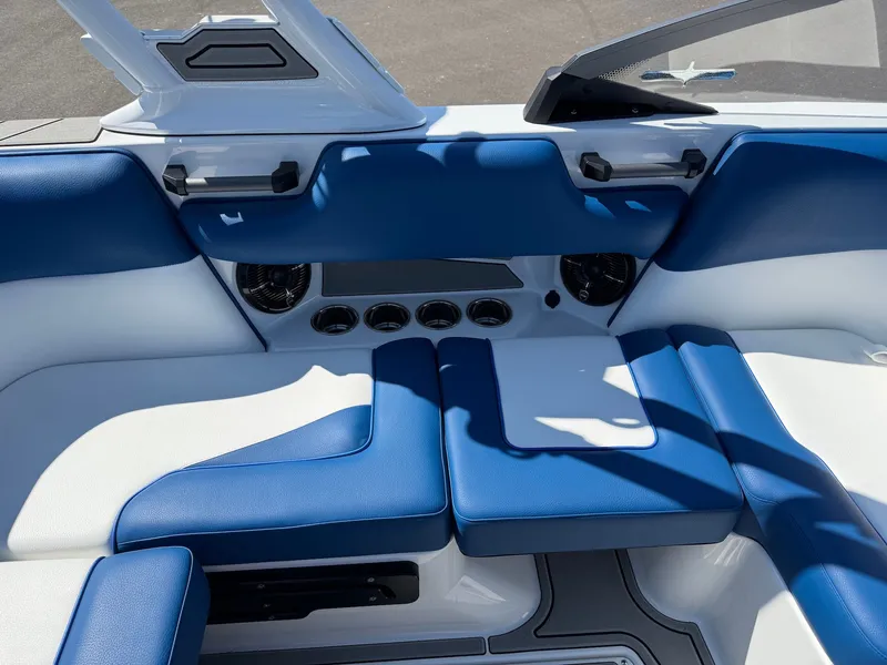 Slide: The Image of Interior of 2026 Moomba Mondo with blue and white seating. - 33