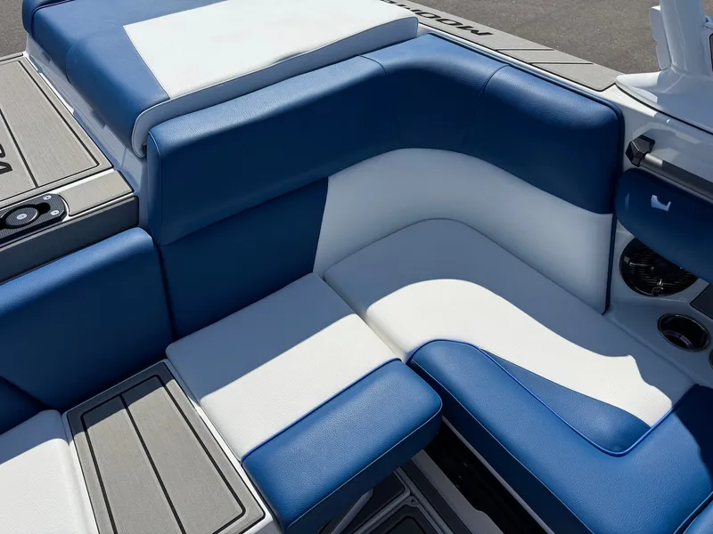 Slide: The Image of 2026 Moomba Mondo interior with blue and white seating. - 34