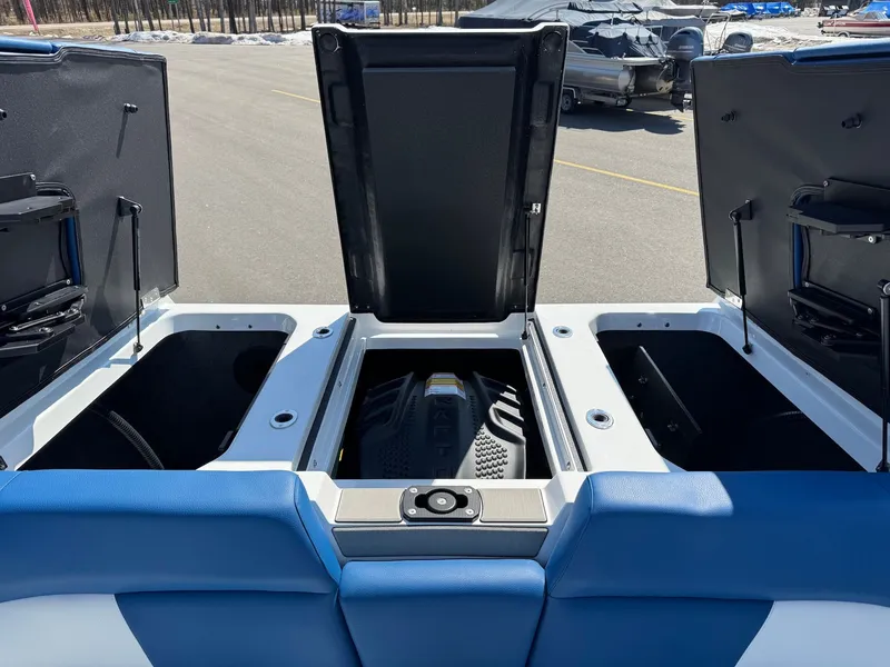 Slide: The Image of 2026 Moomba Mondo boat engine compartment with open hatches. - 40