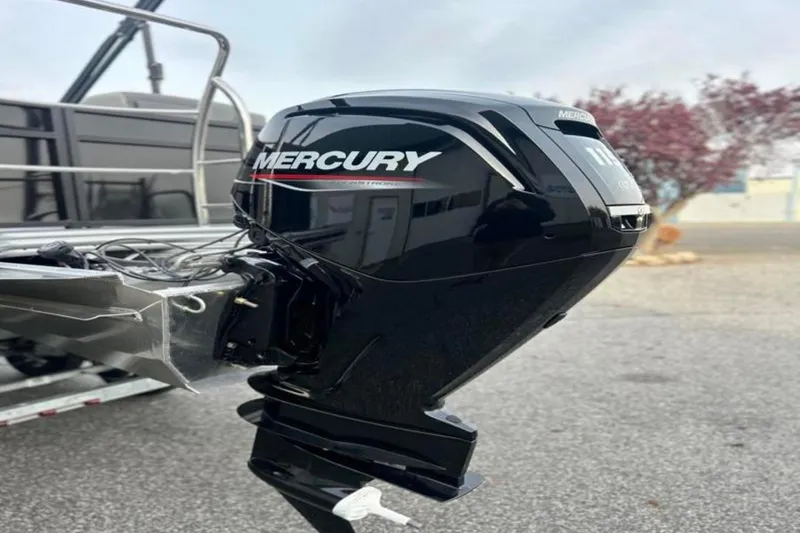 Slide: The Image of 2026 Lowe LS 210 WT boat with Mercury outboard motor on a trailer. - 10