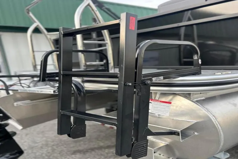 Slide: The Image of 2026 Lowe LS 210 WT boat ladder and railing detail, showcasing sturdy construction. - 14