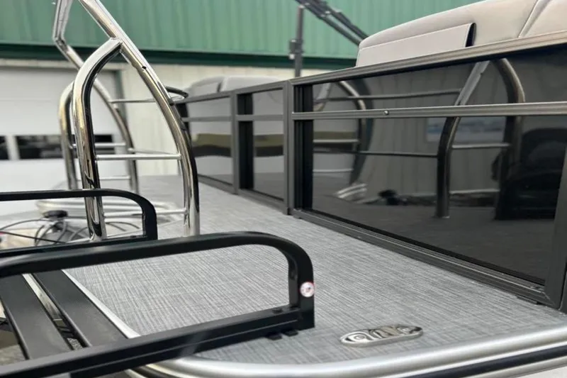 Slide: The Image of 2026 Lowe LS 210 WT boat deck with sleek railing and modern design. - 15