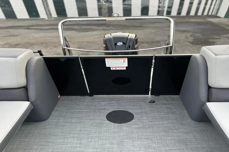 Slide: The Image of 2026 Lowe LS 210 WT boat interior with gray seating and flooring. - 28