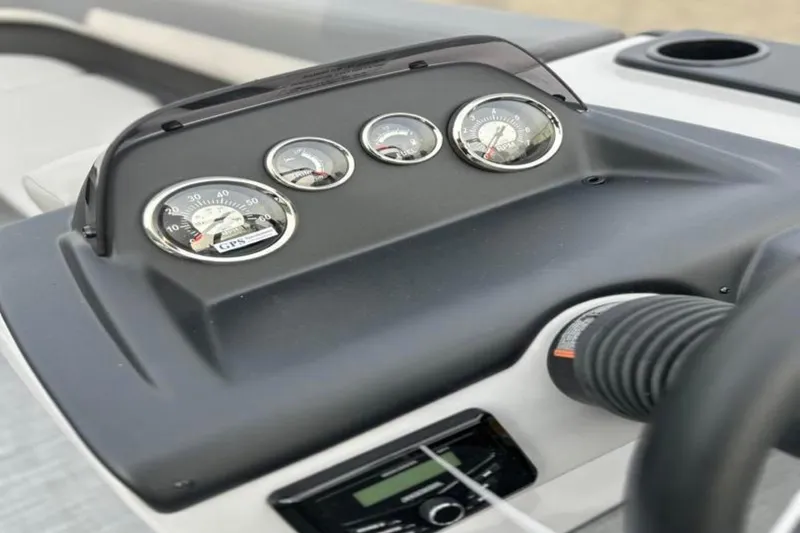 Slide: The Image of Dashboard of 2026 Lowe LS 210 WT boat with gauges and controls. - 32